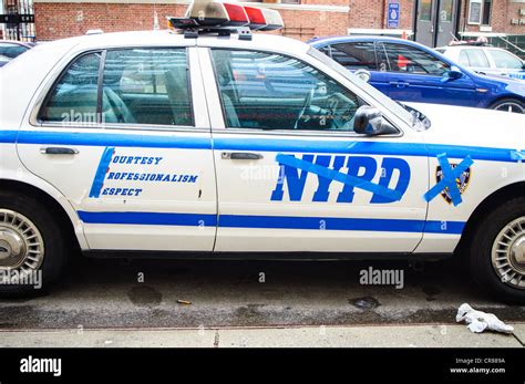 New York City Police Department Cars With Nypd Words And Graphics Taped