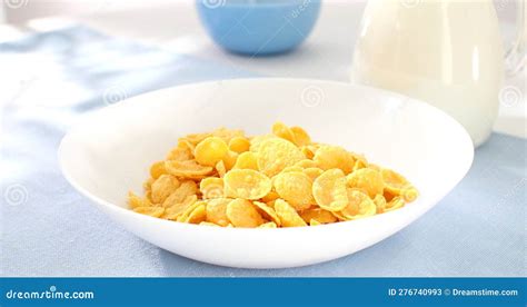 Corn Flakes In A Bowl With Milk Healthy Breakfast On The Table Stock