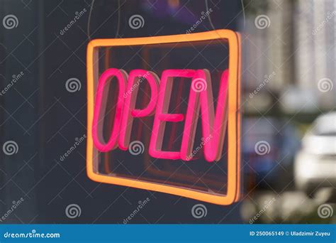 Neon Sign Open On The Glass Door Of A Shop Or Cafe Selected Focus Stock Image Image Of Neon