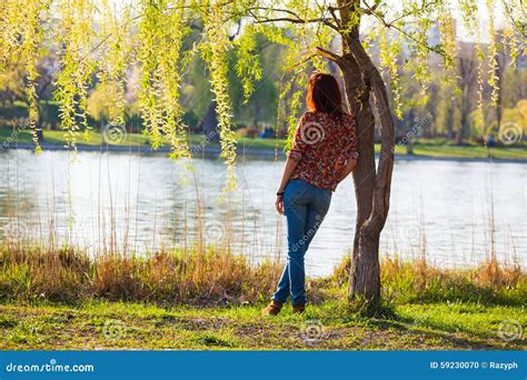 Girl Leaning Against A Tree Pensive Stock Photo Image Of Outdoors