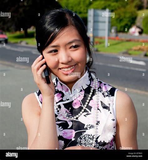 Hong Chinese Girl Woman On Mobile Phone Stock Photo Alamy