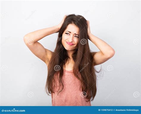 Confusion Grimacing Brunette Woman Thinking And Looking Up In Pink T