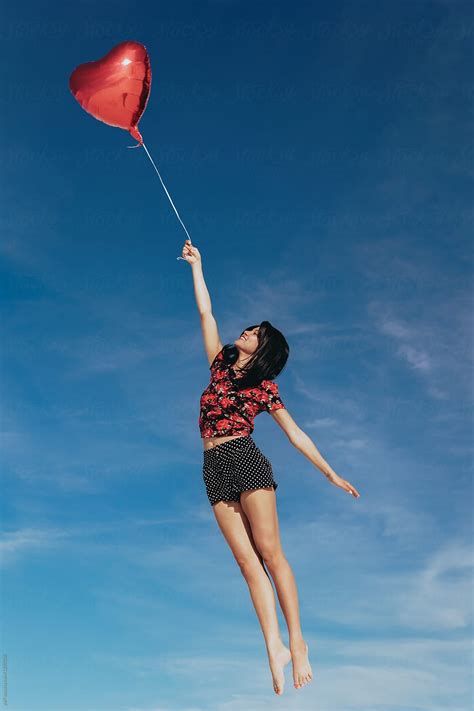 Beautiful Woman Flying Away On A Heart Balloon On Valentine S Day By