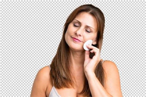 Premium Psd Middle Age Woman Over Isolated Background With Cotton Pad