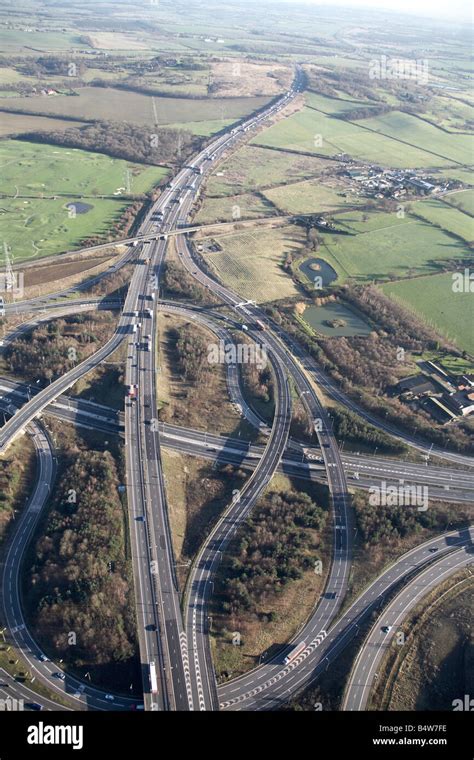 Aerial view south east of M11 Motorway Junction 6 M25 Motorway Junction 27 Hobbs Cross Rd ...