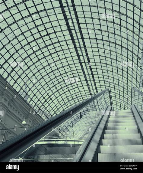 escalator in a shopping mall Stock Photo - Alamy