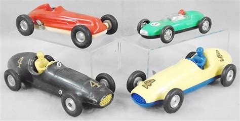 4 Plastic Race Cars