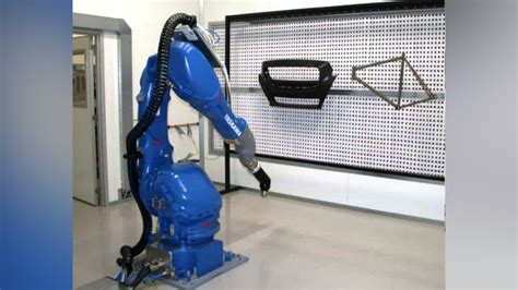 Yaskawa’s Robot Solution For Automated Paint Center Ev Design And Manufacturing