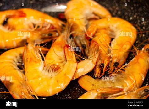 Experience Culinary Excellence With Succulent Shrimp Sizzling In The