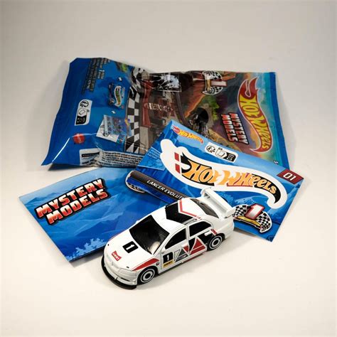 Hot Wheels Mitsubishi Lancer Evolution IX Modelos Mistery Vem