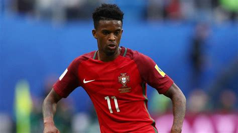 Download Nelson Semedo During Intense Game Wallpaper