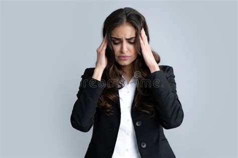 Portrait Of Woman Feeling Stress Or Strain Headache Exhausted Tired