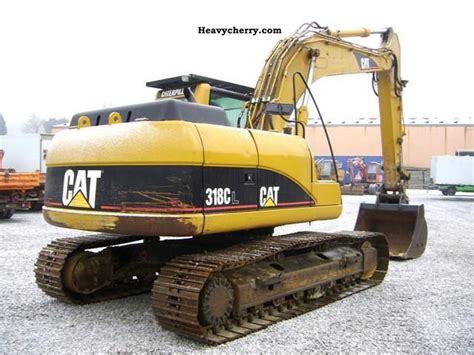 Cat 318 Cl 2003 Caterpillar Digger Construction Equipment Photo And Specs