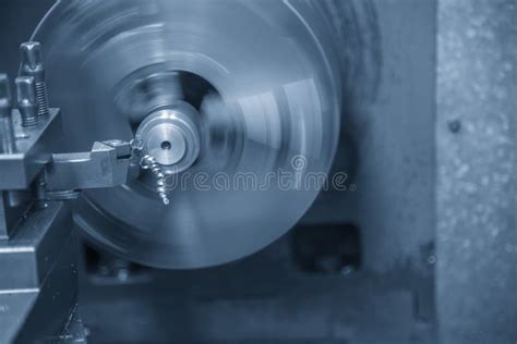 The Operation Of Lathe Machine Cutting The Steel Shaft Stock Image