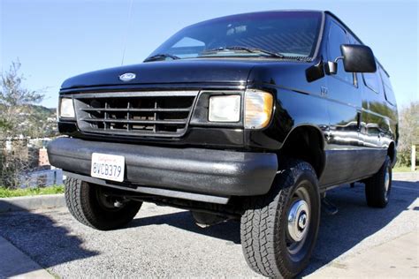 Camper Van For Sale: Ford E350 4x4 (Quigley)