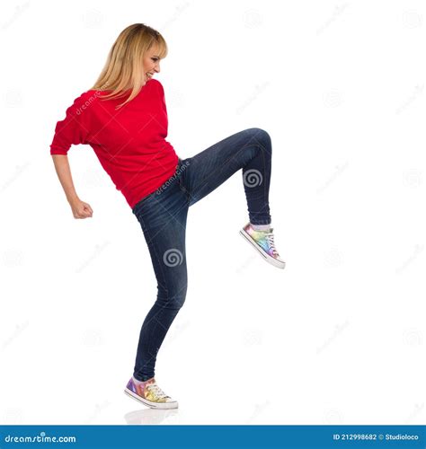 Young Woman Kicks Her Knee Stock Photo Image Of Fist 212998682