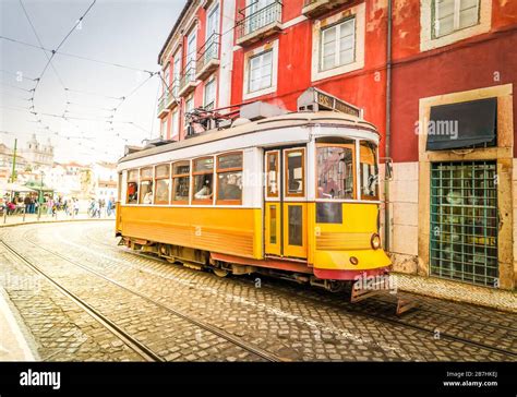 tram on narrow street of Alfama, Lisbon Stock Photo - Alamy