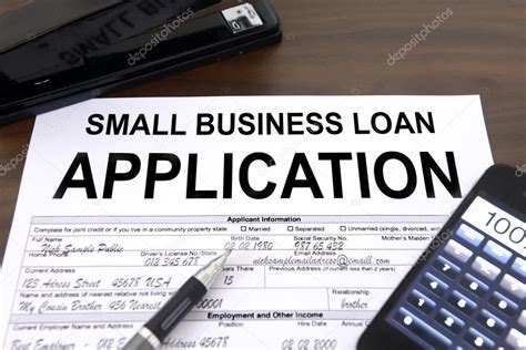 Approved small business loan application form Stock Photo by ©mangostock 21501435