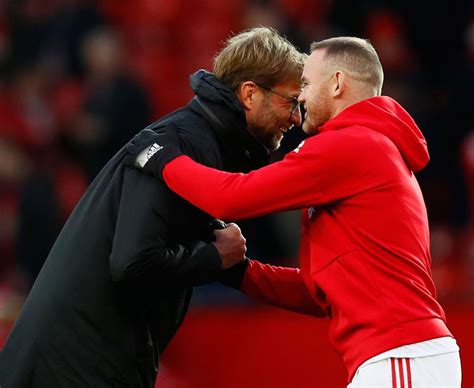 Jurgen Klopp And Wayne Rooney Hug Ahead Of Manchester United V