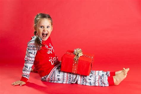 Premium Photo | Cute little girl wearing christmas pajamas