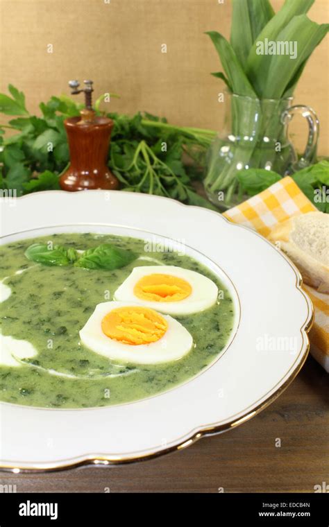 Green Herb Soup With Boiled Eggs Stock Photo Alamy