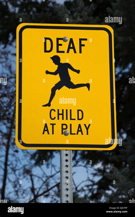 Deaf Child At Play Sign In Suburban Neighborhood Stock Photo Alamy