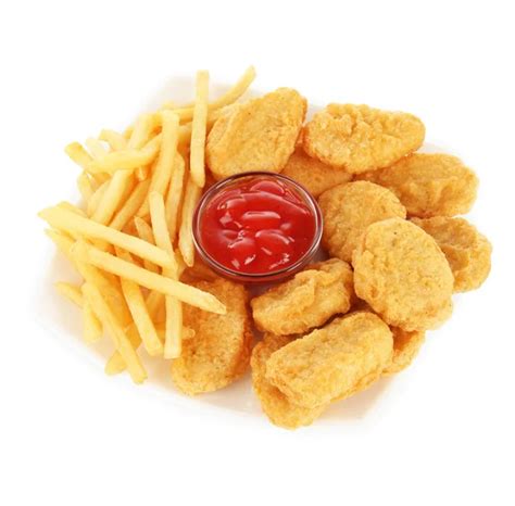 Fried Chicken Nuggets With French Fries And Sauce Isolated On White