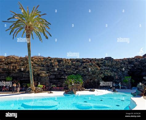 Swimming pool in the lava cave, Jameos del Agua, built by the artist ...