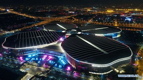 Night View Of National Exhibition And Convention Center In Shanghai