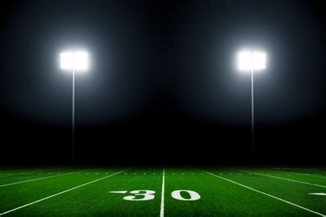 Football Field Illuminated By Stadium Lights Stock Photo 15794753