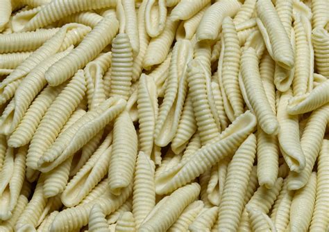 Uncooked Italian Maccheroni Al Pettine Pasta Background 14507925 Stock