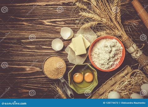 Baking Concept Baking Ingredients Butter Flour Sugar Eggs On Rustic Wood Background Stock