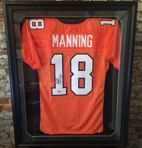 √ Framed Peyton Manning Jersey