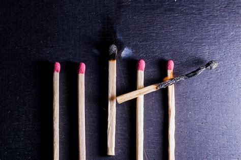 Premium Photo A Burning Wooden Matches Closeup