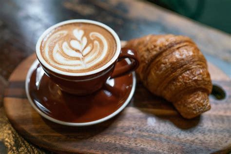 A Croissant and a Cup of Coffee · Free Stock Photo