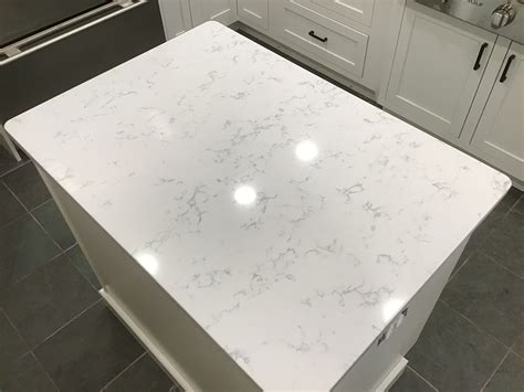 Featured Project Quartz In Elegant Carrara Lumos IVO Cabinets Surfaces