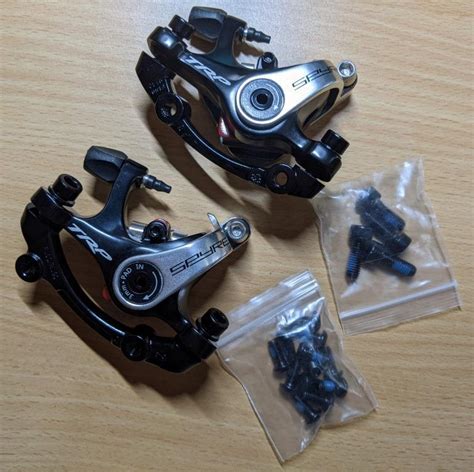 One Set Of New Trp Spyre Mechanical Disc Calipers Post Mount Sports