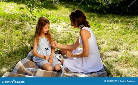 Beautiful Mom and Daughter Playing a Game of Rock, Paper, Scissors in ...