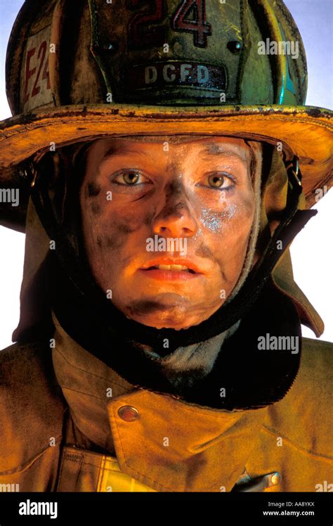 Female firefighter studio portrait fire fighter Stock Photo - Alamy