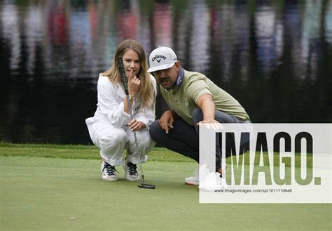 Erik Van Rooyen Of South Africa Helps His Wife Rose Line Up A Putt As