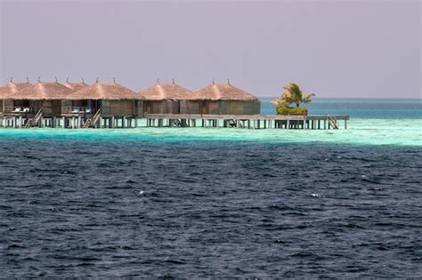 Premium Photo | Maldives on water bungalow resort view from ocean