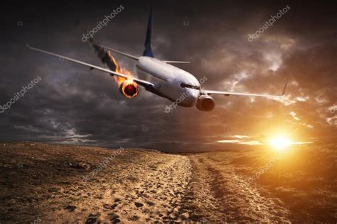 Plane with engine on fire about to crash Stock Photo by ©sdecoret 122871388