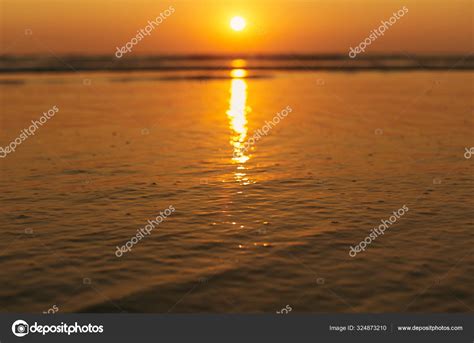 Beautiful Sunset at Arambol Beach. Blurred image — Stock Photo ...