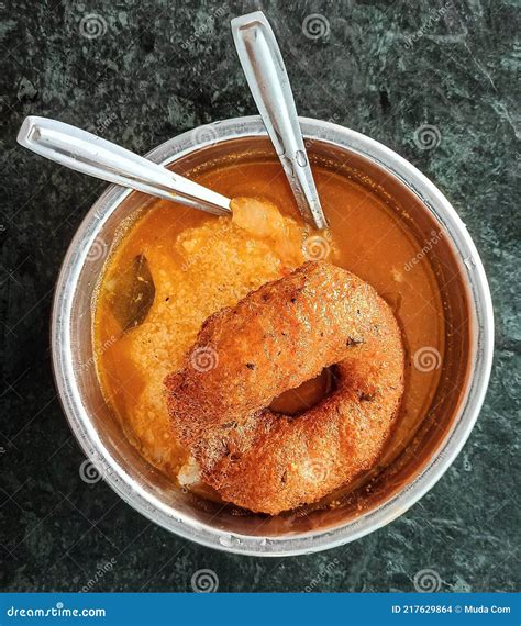 Cooked Rice Dipped In Sambar Along With Medu Vada Stock Photo Image