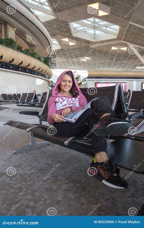 Woman Sitting In Airport Lounge Stock Photo Image Of Portrait