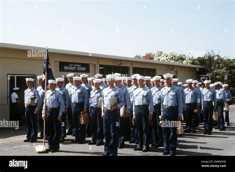 Recruits stand in formation during boot camp activities at the Naval ...