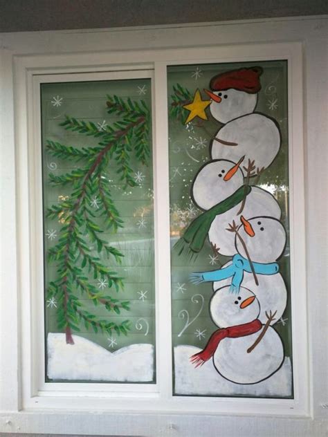 Snowman painted on window a=for Christmas decoration. - Blurmark