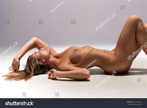 Beautiful Sunburned Brunette Nude On Gray Stock Photo Shutterstock