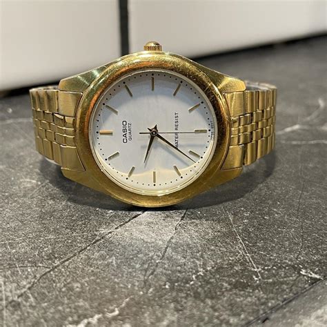 Casio Men S Gold And White Watch Depop