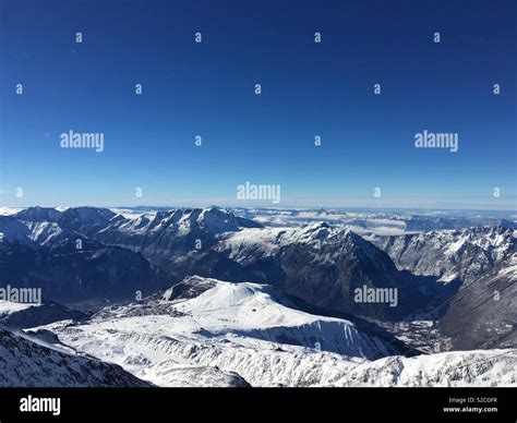 Blue sky mountains Stock Photo - Alamy